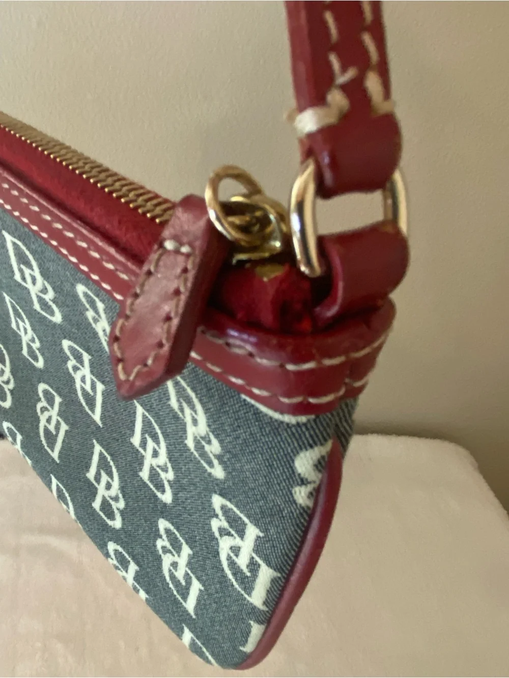 Dooney & Bourke DB Logo Canvas Wristlet with Red Trim and Extender